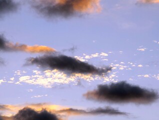 Wall Mural - Colored Clouds at Sunset