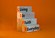 LIFE living in faith everyday symbol. Concept words LIFE living in faith everyday on wooden blocks on beautiful orange background. Business LIFE living in faith everyday concept. Copy space.