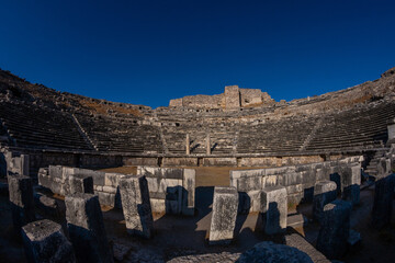 Milet, Miletus-Balat. Miletus theater. The ancient roman amphitheater at Miletus, Turkey. The ancient harbour city of Miletus was the economic and cultural centre of the eastern Aegean.