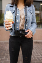 Close Up Girl With Digital Camera And Soft Serve Ice Cream Cone