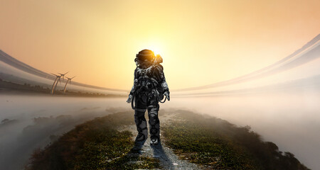 Wall Mural - astronaut walking on an unexplored planet . mixed media