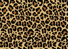 Leopard Print Seamless Trendy Pattern On A Yellow Background, Vector Texture For Printing Clothes, Fabrics.