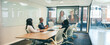 Leinwandbild Motiv Modern businesspeople having a virtual briefing in a boardroom