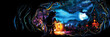 Fantasy traveler banner / A mouse in human-like pose with a road staff and a lantern, fable old town with lights in the background. Digital painting