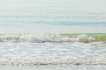 Wall Mural - photo of surface motion water of sea or ocean with beautiful sky blue light tone.