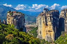 The Agia Triada (literally "Holy Trinity") Monastery, In The Monastic Complex Of Meteora. Trikala, Thessaly, Greece. In The Background, Kalambaka Town