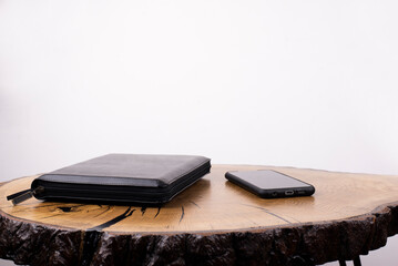 Wall Mural - Holy Bible. Open Bible, on the table. Phone and book on the table.