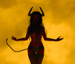 Illustration of a female demon devil sucubuss with horns and a tail posing with her arms outstretched against a fiery background
