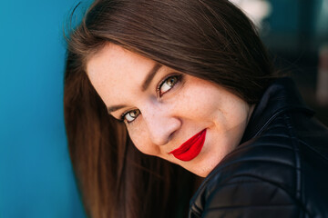 Wall Mural - closeup of girl face with bright makeup. girl with freckles look