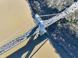 Aerial view of George Washington Bridge in Fort Lee, NJ. George Washington Bridge is a suspension bridge spanning the Hudson River connecting NJ to Manhattan.