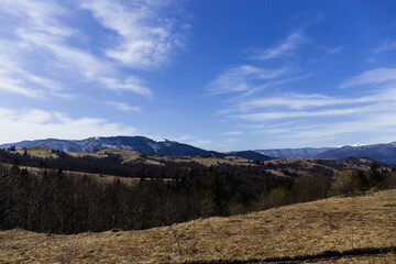 Wall Mural - Scenic view of mountains and blue sky at background.