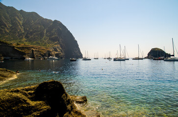 Punta Perciato, Pollara, Salina. Rocky coastline and blue clear sea, Aeolian Islands Archipelago, Sicily, Italy.
