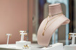 © Venera T - Showcase in jewellery store. jewelry diamond gold shop with rings and necklaces luxury retail store window display showcase