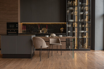 kitchen veiw of a chic modern design of a dark expensive interior of a luxurious country house with huge panoramic windows and a magnificent view of the divine forest