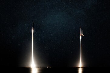 Fototapete - Two blast-off space rockets take off into the starry sky. Space shuttles and spaceship successful launch on space mission and colonization of mars