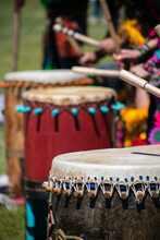Traditional Native American Drum Being Played During A Cultural Celebration