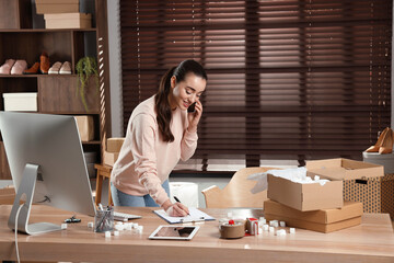 Poster - Seller talking on phone in office. Online store