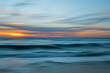 © Hanna Tor - Tropical beach sunset, abstract. Beautiful sea, and colorful sky. Motion blur, line art