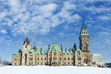 Ottawa parliament East Block, on a winter day with deep snow. The Canadian Houses of Parliament date back to 1867 and are modeled on the UK Parliamentary structure.