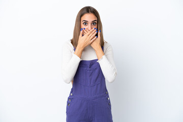 Young caucasian woman isolated on white background covering mouth with hands