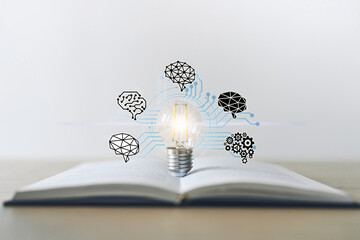 light bulb with textbook. success idea business learning and knowledge