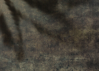 Wall Mural - Empty rusty stone or metal surface texture. Grunge wall background with leaves shade