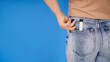 © Viktoria Ostroushko - disposable electronic cigarettes in the pocket of blue jeans close-up. place for text