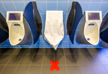 Canvas Print - typical urinals at a public restroom