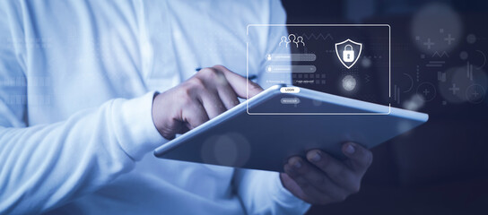Man using tablet to Privacy protect data and cybersecurity. Network security and data protection.User login,Protective Personal Data information. Technology cyber Services password on virtual screen.