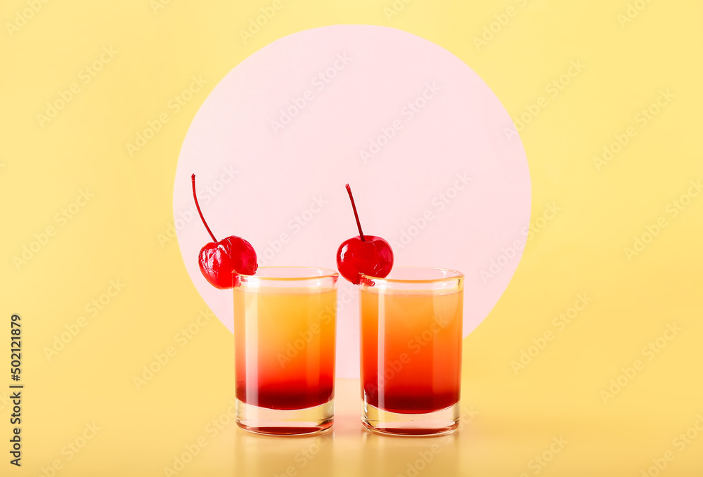 Tasty Pineapple Upside Down Cake Shots on beige background