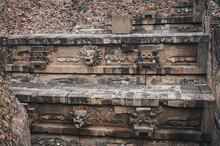 Stone Carving Details At The Temple Of Quetzalcoatl (the Feathered Serpent) At Teotihuacan Ancient City In Mexico. The Pyramid Is Decorated With Feathered Serpent Heads And Snake-like Creatures.