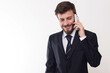 © mbnuysal - Businessman Talking on Cell Phone