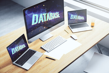 Wall Mural - modern computer monitor with creative database word hologram, research and development concept. 3d r
