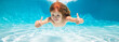 © Volodymyr - Kid swim underwater in pool. Child boy swimming under water with thumbs up. Banner for header, copy space. Poster for web design.