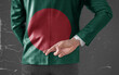 Jacket Flag of Bangladesh on Businessman with his fingers crossed behind his back