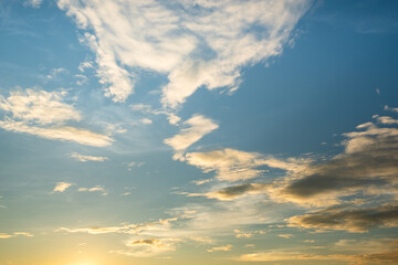 Wall Mural - colorful sunset and sunrise with clouds. blue and orange color of nature. many white clouds in the b