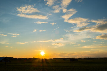 Wall Mural - colorful sunset and sunrise with clouds. blue and orange color of nature. many white clouds in the b