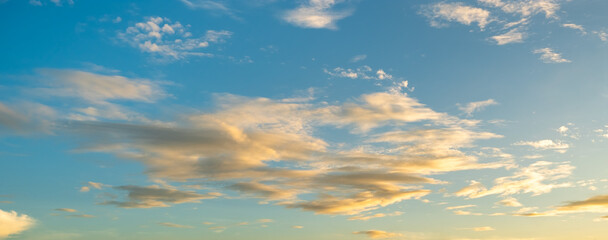 Wall Mural - colorful sunset and sunrise with clouds. blue and orange color of nature. many white clouds in the b