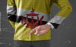Jacket Flag of Brunei on Businessman with his fingers crossed behind his back