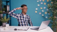 Office Worker Doing Military Salute To Show Respect And Patriotism, Advertising Army Soldier Honor Gesture In Front Of Laptop Screen. Person Saluting With Veteran Sergeant Sign At Computer.