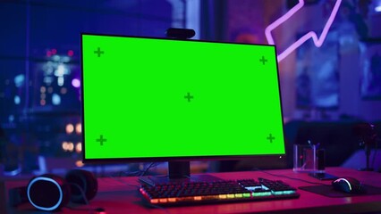 Fototapete - Gaming at Home: Empty Gaming Station with Player's Personal Computer with Green Screen Chroma Key Display Standing on a Wooden Desk in Stylish Loft Apartment with Neon Lights. Arc Shot.