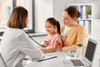 © Syda Productions - medicine, healthcare and pediatry concept - mother with little daughter and doctor with stethoscope at clinic