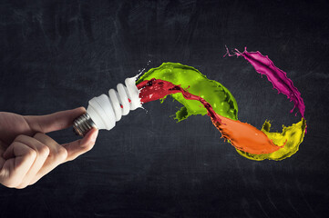 Wall Mural - Light bulb with colour paint splash