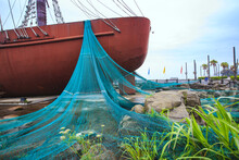 Fishing Boats And Green Fishing Net