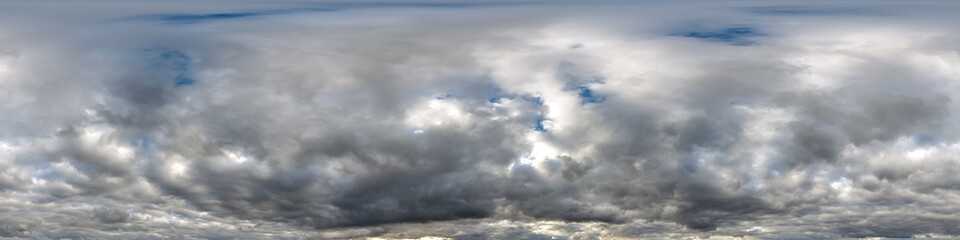 Wall Mural - blue sky with dark beautiful clouds before storm in seamless hdri panorama 360 degrees angle view wi