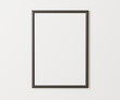 Black frame mockup on white wall, 3:4 ratio, 30x40 cm, 18x24