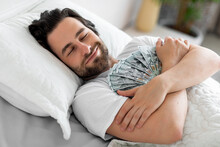 Wealthy Man Sleeping With Lots Of Currency Notes