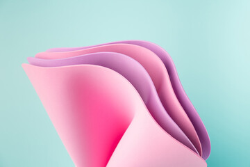 Summer colors in wavy sheets on a mint background. Abstract bright backdrop.