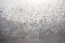 Raindrops On The Surface Of Window Panes On A Cloudy Day.