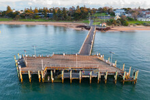 Aerial View Of Wooden Platform At The End Of A Coastal Jetty